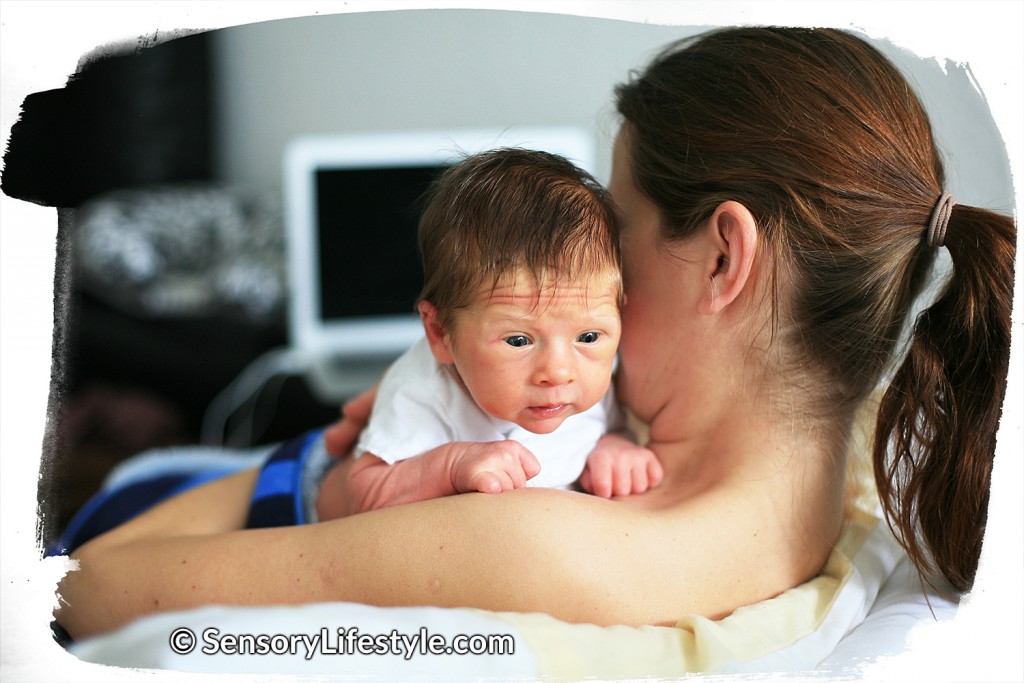 Newborn Josh laying on mom's chest