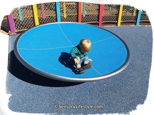 Magical Bridge Playground - Josh enjoying spinning time