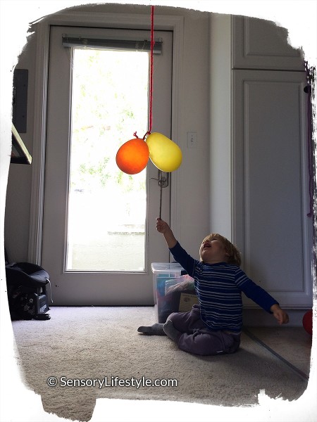 15 month toddler activity: Suspended balloon