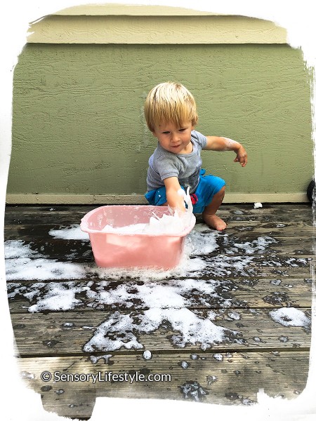 16 month toddler activities: Playing in clean mess