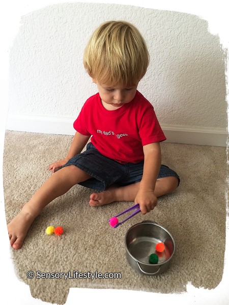 17 month old toddler activities: Josh with tongs