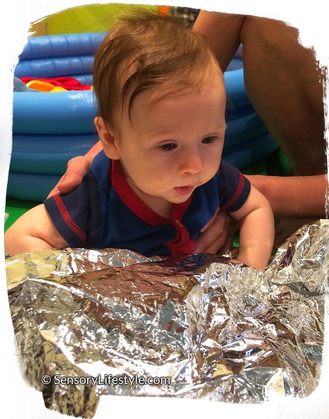 4 month old baby activates: Josh with aluminium blanket