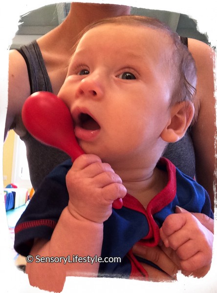 4 month old baby activates: Josh with rattle
