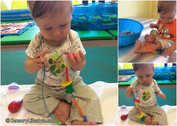 8 month baby activities: Chewy necklace