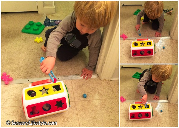 23 month toddler activities: pom pom squeeze