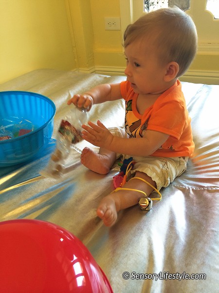 9 month old baby activities: Shaker