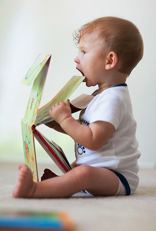 Josh eating a book consuming knowledge